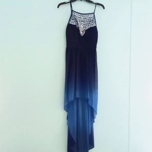 Elegant navy blue ombre dress with rhinestone stitched in the top.
